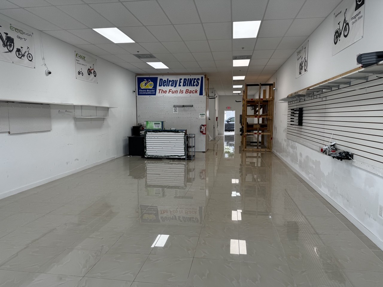 E-bike store after liquidation showing cleared floor