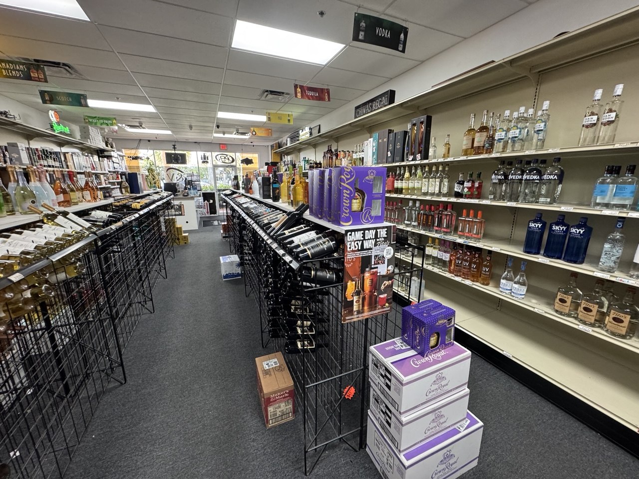 Liquor store aisle inventory prepared for short-notice auction liquidation
